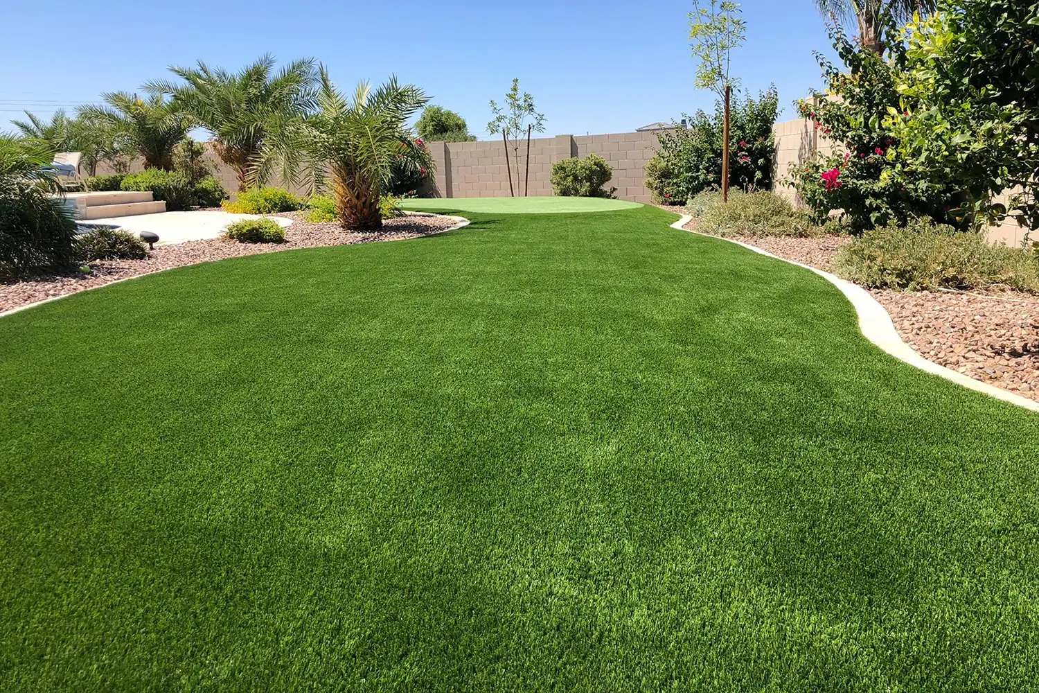 Artificial grass backyard installed by Jax Outdoor Solutions