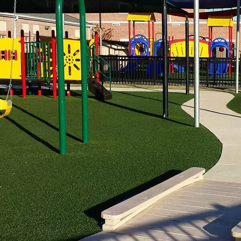 Close up shot of Jax Outdoor artificial grass playground