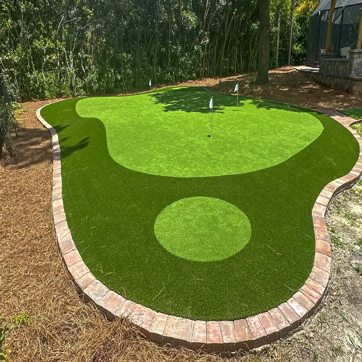 Backyard golf green installed by SYNLawn