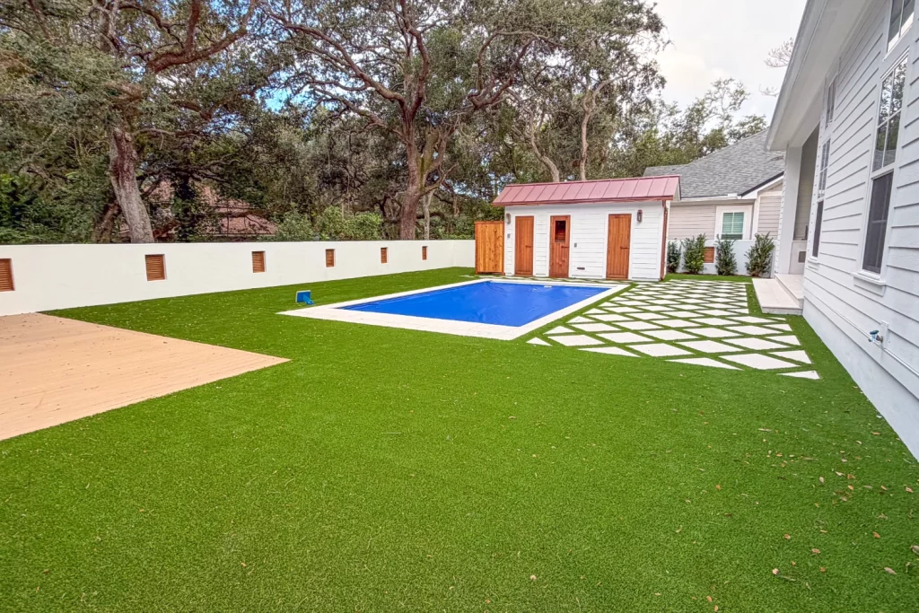 backyard pool & artificial grass installation