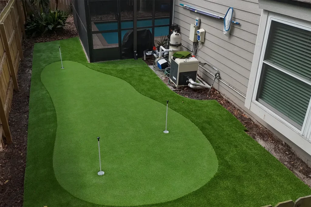 Backyard golf green installed by Jax Outdoor