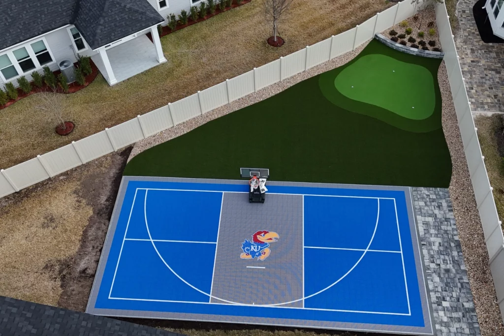 Backyard artificial grass installation from Jax Outdoor Solutions