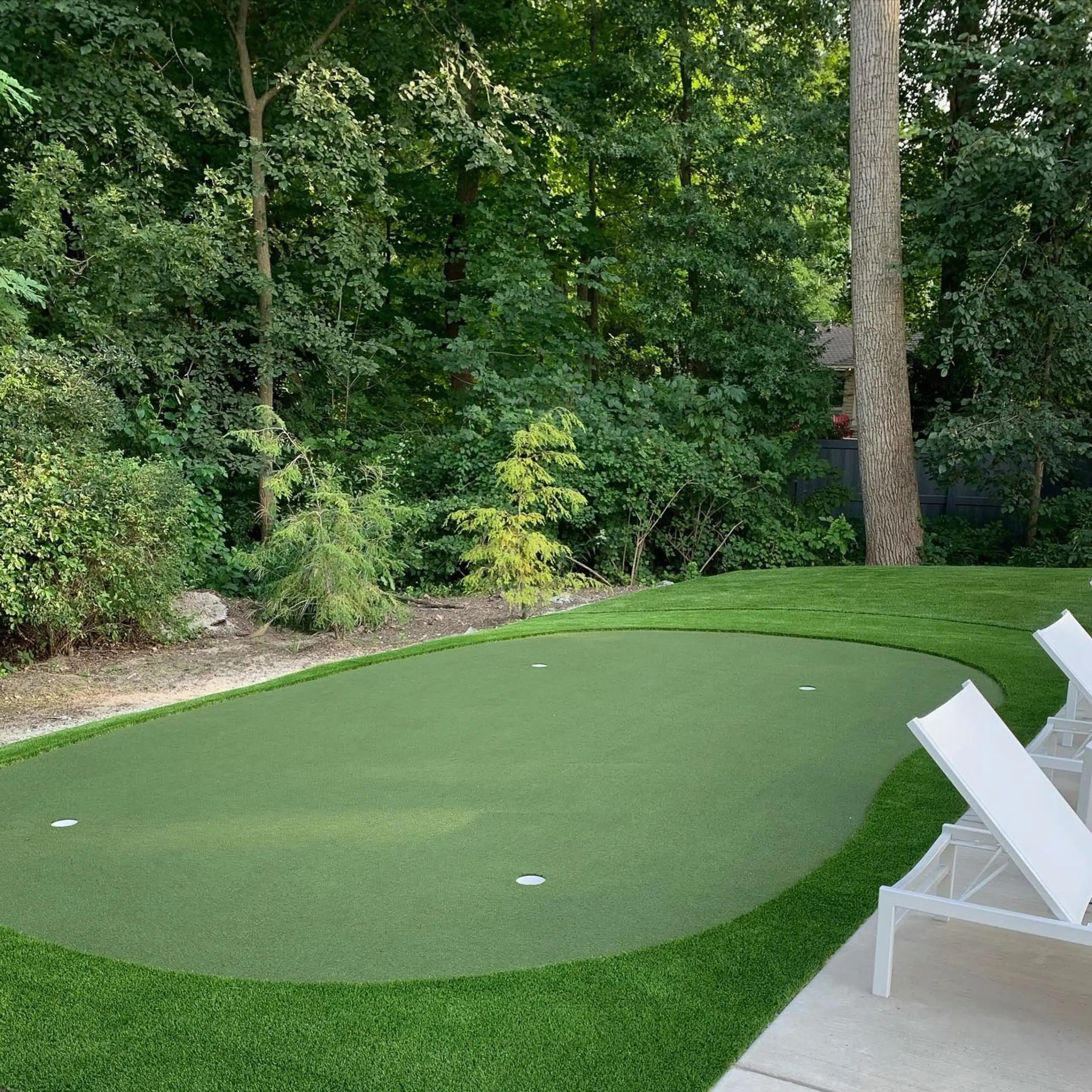 Backyard golf green installed by Jax Outdoor