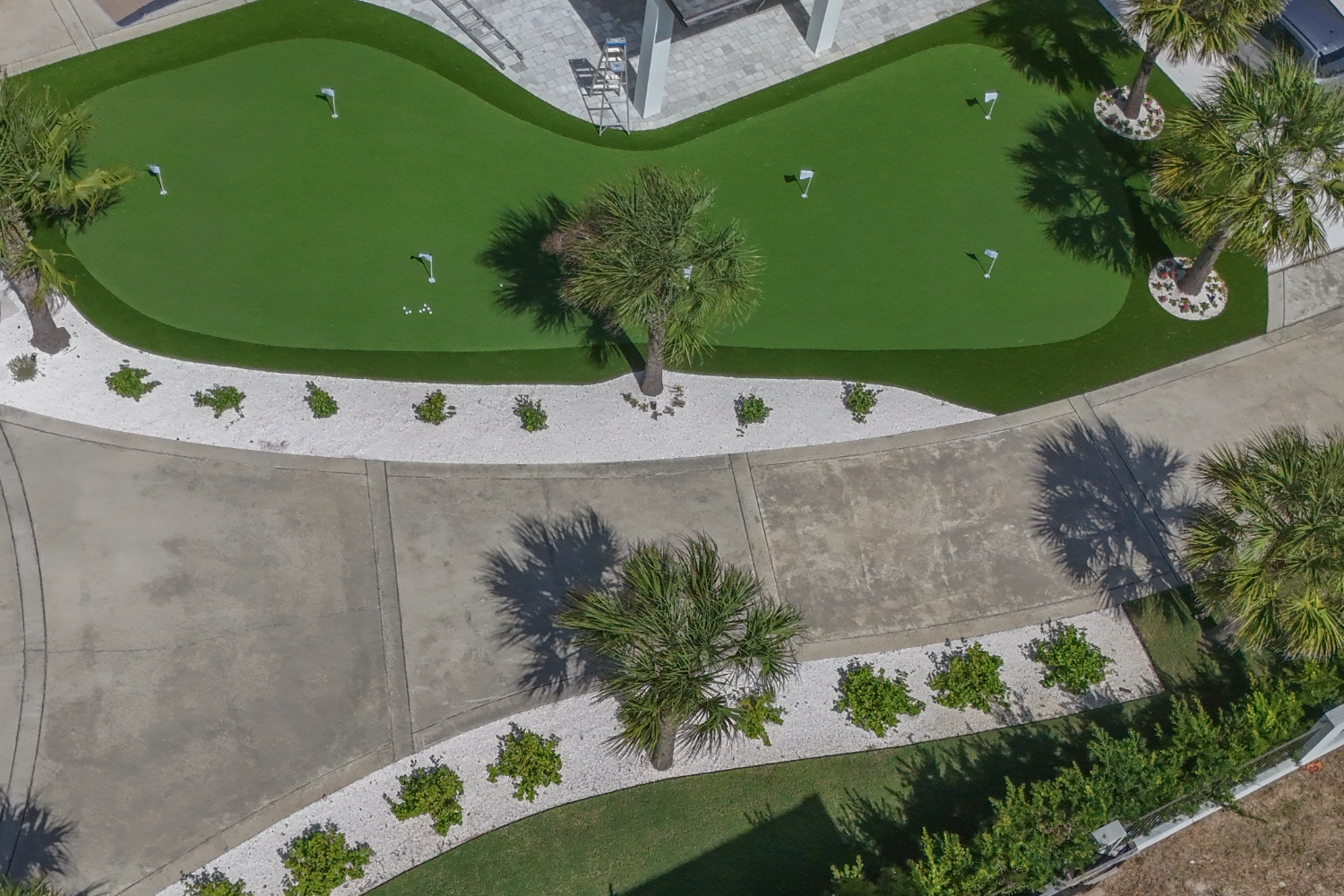 Artificial grass putting green installation